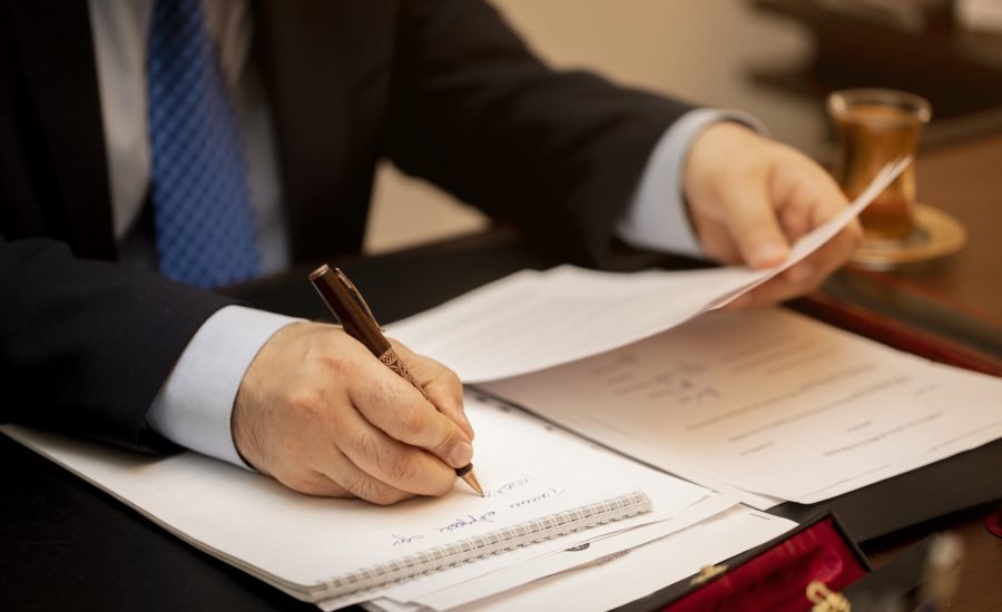 Businessman signing important contract papers Businessman signing important contract papers. High quality photo